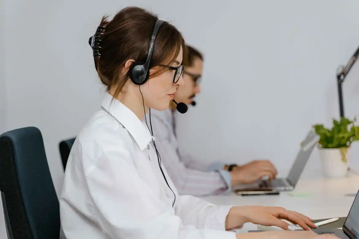 Entry-level IT support professionals assisting users with technical issues